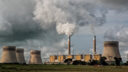 Coal electricity generation belchingsmoke and steam into the sky