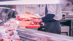 Butcher Chopping Meat